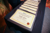 Awarding of degrees to UNIB scholarship recipients in Ecuador.